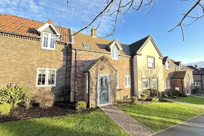 Image de Stunning 2 bed coastal cottage - Pool and Beach Access Included.