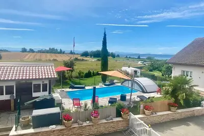 Image de Homerez - Studio confortable à Bevaix avec vue montagne - 30 m² + Spa