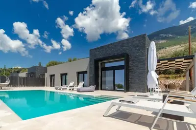Image de Modern villa in Lourdas with infinity pool and panoramic sea views
