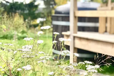 Image de Villa met Houtgestookte Hottub & Sauna aan het Meer