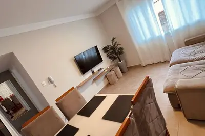 Image de Lindo Apartamento Reformado Na Praia Da Enseada! ! ! ! !