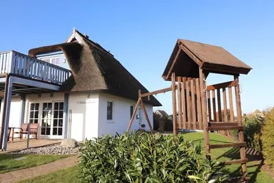 Image de Maison de vacances 'Achternkieker' avec vue sur la mer, terrasse privée et Wi-Fi
