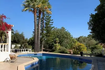 Image de Logement, esp. privés ext, jardin, piscine, 5 min des plages et la Ria Formosa