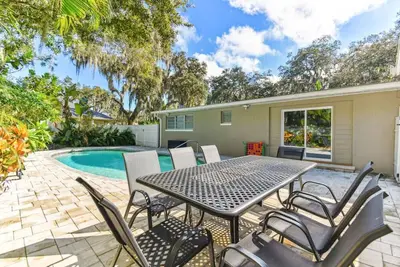Image de By the River Home with Pool