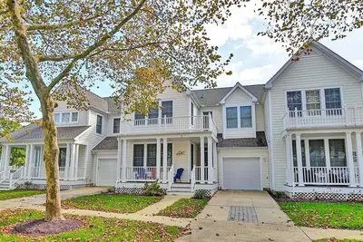 Image de Comfortable and Dog Friendly 3 bed Townhome in Bear Trap Dunes Community! Pool, Tennis, Clubhouse, Wifi, Beach shuttle, Great Amenities!
