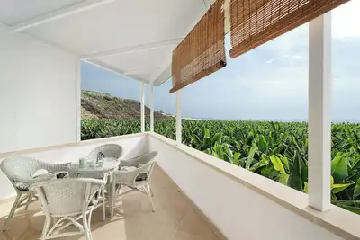 Image de Maison de vacances \"Playa la Arena vue sur la mer\" avec terrasse privée et Wi-Fi