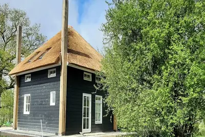 Image de Maison confortable avec jardin, parking et jacuzzi