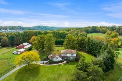 Serene 51-Acre Estate with Beautiful Farmhouse-Your Nature Retreat Awaits!