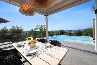 Image de Modern Villa, A/C, Private Pool, Superb Setting & Sea Views 15mins walk to Acharavi or Roda Beach!