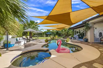 Image de Estate sized backyard wonderland with saltwater pool and custom fire pit!
