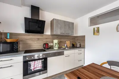 Image de Appartement 'Am Süßen See' avec vue sur le lac, balcon et Wi-Fi