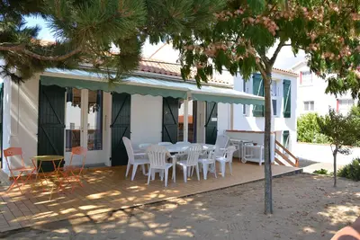 Image de Maison de vacances 'Les Floralies' avec terrasse privée, jardin privé et Wi-Fi