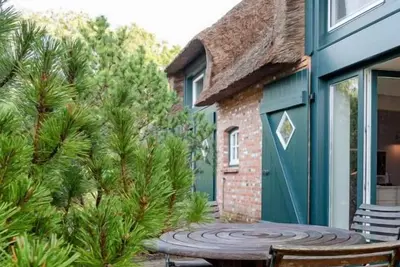 Image de Ferienhaus Föhrstuben Wohnung Fleederbeerstuv