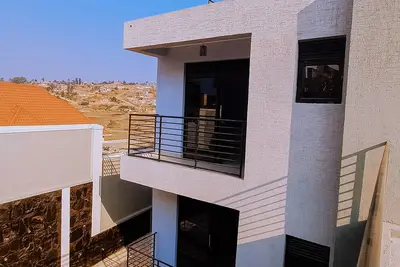 Image de Spacious 4-Bedroom Oasis with Rooftop View - Near Kigali Airport & City Center