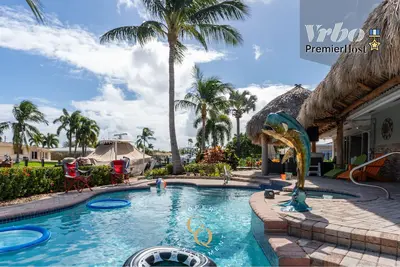 Image de Canal Oasis W/ Private Dock & Poolside Paradise!