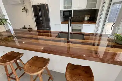 Image de River front property, huge yard and pool, 2km from the beach.