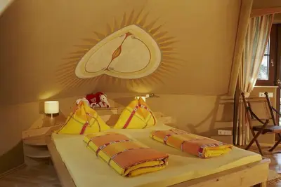Image de Bionest Iv - Lehmbaudach-familienzimmer mit Balko - Biolandhaus Arche