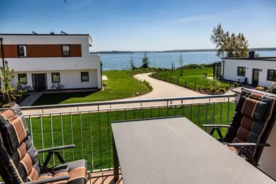 Image de Traumhaftes Appartment mit Seeblick, Sauna, Kamin, Dachterrasse und Stadtnähe