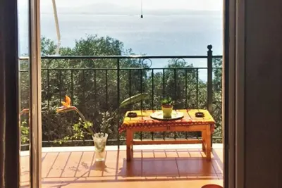 Homerez - Appartement vue mer Nissaki 65m² climatisé