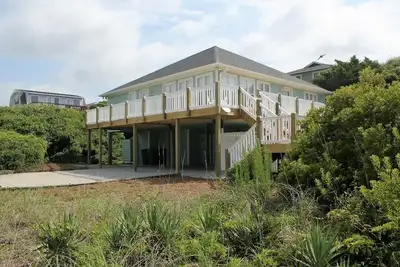 Image de Pool and beach access steps away from driveway!