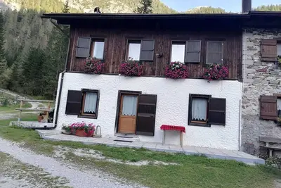 Image de Appartement 'Val Visdente 1' avec vue sur les montagnes, jardin partagé et Wi-Fi