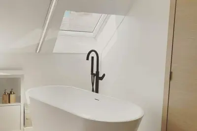 Image de Appartement cosy avec bain îlot