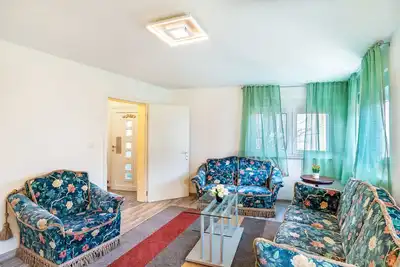 Image de Maison de vacances 'Haus Am Bach' avec terrasse privée et balcon