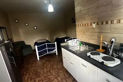 Image de El Puente cómodo estudio cocina y baño privados, metro General Anaya a 2 minutos