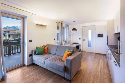 Image de Appartement 'La Sorgente Ville Di Fiemme' avec vue sur les montagnes, terrasse privée et Wi-Fi