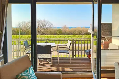 Image de Appartement 'Villa Deichgraf 07 Ostseeblick' avec vue sur la mer, balcon et Wi-Fi