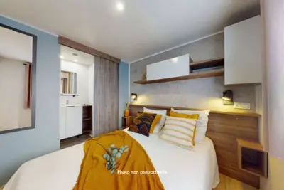 Image de Mobile Home 'Gastes' avec piscine partagée, terrasse privée et climatisation
