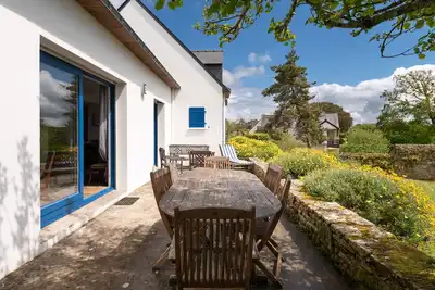 Image de Maison de vacances 'La Maison Aux Volets Bleus' avec terrasse privée et jardin privé