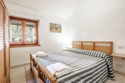 Appartement 'La Capannuccia C' avec jardin partagé, Wi-Fi et climatisation