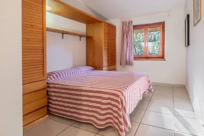Appartement \"La Capannuccia B\" avec jardin partagé, Wi-Fi et climatisation