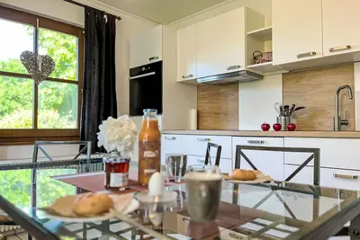 Image de Agréable appartement dans une maison de vacances avec Wifi, Tv, terrasse et animaux admis