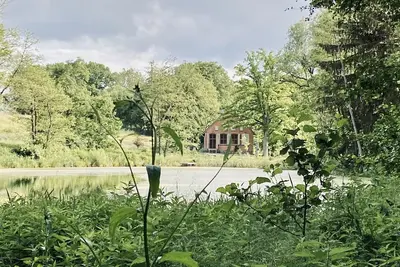 Image de An old restored school in wild nature. Unique interiors and one-of-a-kind aura.