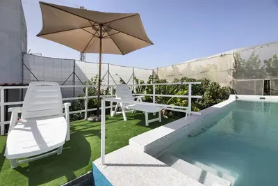 Image de Appartement 'Las Cerezas' avec vue sur les montagnes, piscine partagée et terrasse privée