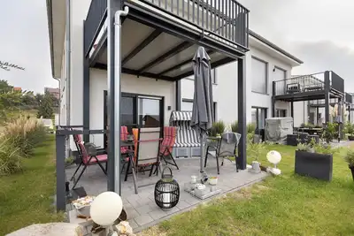 Image de Appartement de vacances \"20b Am Goitzsche See\" avec vue sur le lac, terrasse privée et Wi-Fi