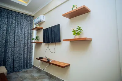 Image de 5 minutes drive to the beach! 1 Br unit with free Wi-Fi, 24hr security