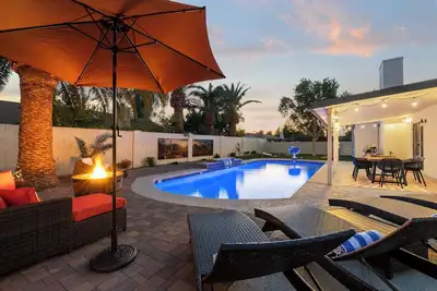Image de Peaceful Palm: Farmhouse Chic w/Pool & Games!