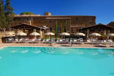 Image de Appartement d´hôtel avec air conditionné et une piscine extérieure