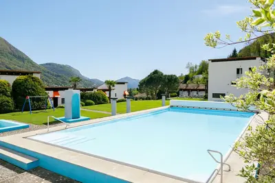 Image de Villaggio Sureggio - App. A7 by Interhome