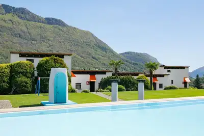 Image de Villaggio Sureggio - App. A6 by Interhome