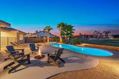 Image de Palms Place | Fairway Views + Pool & Spa | Pets Ok