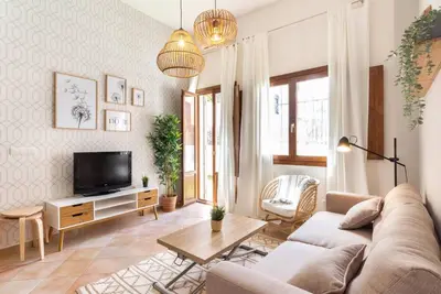 Image de Apto Real Bajo Cartuja. Appartement avec patio privé et Wi-Fi.