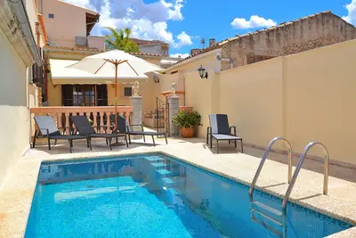 Image de Ca n'Aina Canta 064 maison de village avec piscine, terrasse, barbecue et air conditionné