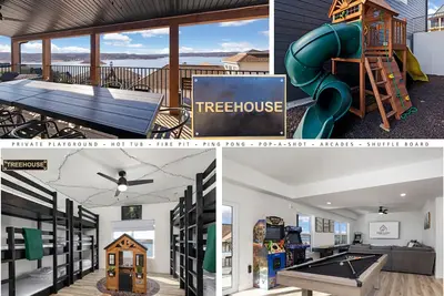 Image de Themed new 7 bdrm home w/ lake views, hot tub, fireplace, fire pit, & game room