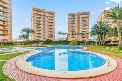 Image de Appartement 'Puerto Mar I Bloque 1 4-4' avec vue sur la mer, piscine partagée et Wi-Fi