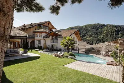 Image de Appartement 'Naturoase Stegerhof Vergissmeinnicht' avec vue sur la montagne, piscine et sauna