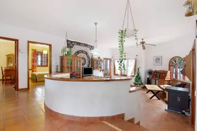 Image de Maison de vacances 'Finca Palmeras' avec vue sur la mer et la montagne, piscine privée et Wi-Fi